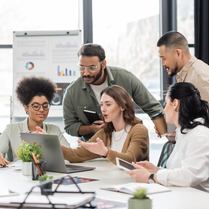 a team discussing their employee feedback program